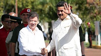 Santos y Maduro inician su reunión blindados ante protestas ciudadanas