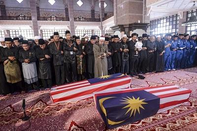 Malasia recibe las primeras víctimas del MH17 en jornada de luto nacional