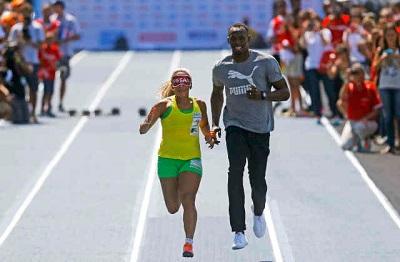 Usain Bolt corre como guía de la atleta ciega más rápida del mundo