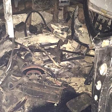 Vehículo robado estaba desmantelado en taller