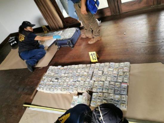 Fiscalía de Guatemala encuentra 15 millones de dólares en una vivienda
